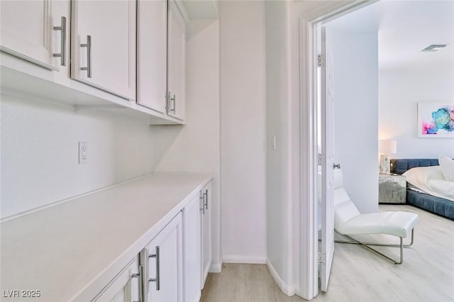 10667 Olympic Pine Dr, Las Vegas, NV 89135 - ensuite bathroom featuring wood finished floors and baseboards