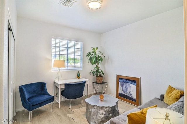 10667 Olympic Pine Dr, Las Vegas, NV 89135 - sitting room with wood finished floors and baseboards
