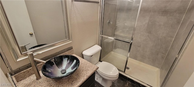 3151 Soaring Gulls Dr Unit 1074, Las Vegas, NV 89128 - full bath featuring toilet, a shower stall, and vanity