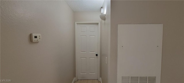 3151 Soaring Gulls Dr Unit 1074, Las Vegas, NV 89128 - hallway featuring light wood-style flooring and baseboards