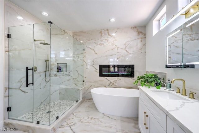 3028 Treesdale Dr, Las Vegas, NV 89134 - full bathroom featuring tile walls, vanity, marble tiled flooring, a freestanding tub, and a marble finish shower