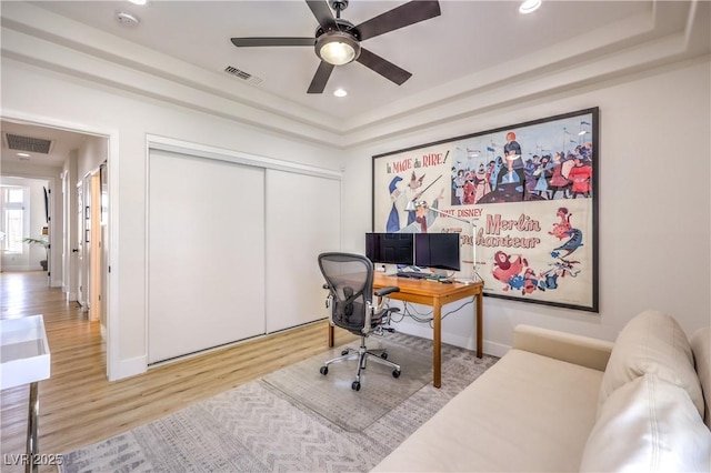 3028 Treesdale Dr, Las Vegas, NV 89134 - office space with a tray ceiling, wood finished floors, ceiling fan, recessed lighting, and baseboards
