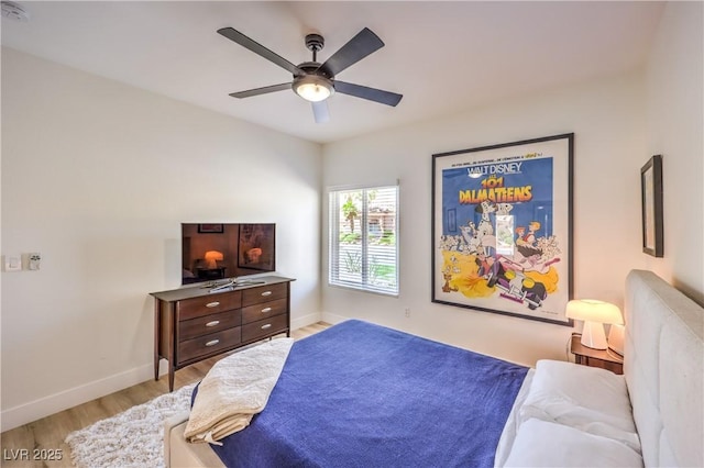 3028 Treesdale Dr, Las Vegas, NV 89134 - bedroom with light wood-type flooring, baseboards, and ceiling fan