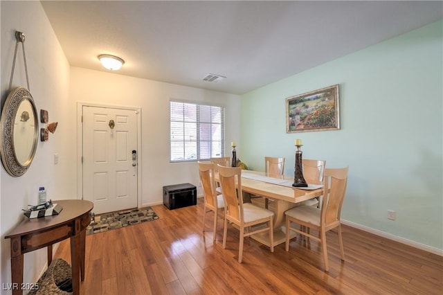 10353 Yew Blossom Ave, Las Vegas, NV 89166 - dining area featuring wood finished floors and baseboards