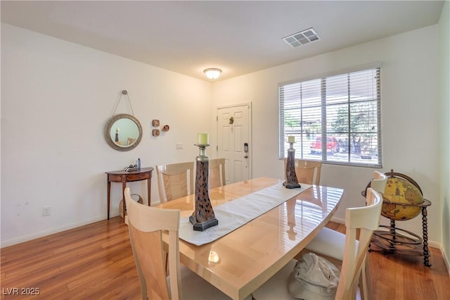 10353 Yew Blossom Ave, Las Vegas, NV 89166 - dining room with wood finished floors and baseboards