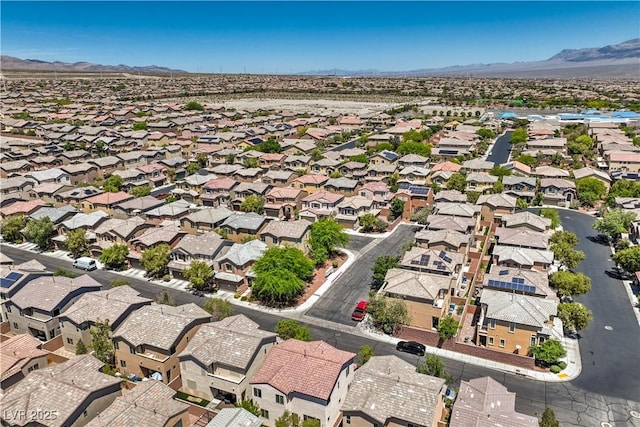 10353 Yew Blossom Ave, Las Vegas, NV 89166 - aerial overview of property's location with mountains and nearby suburban area