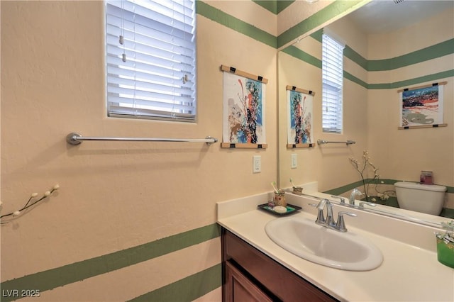 10353 Yew Blossom Ave, Las Vegas, NV 89166 - bathroom featuring vanity and toilet