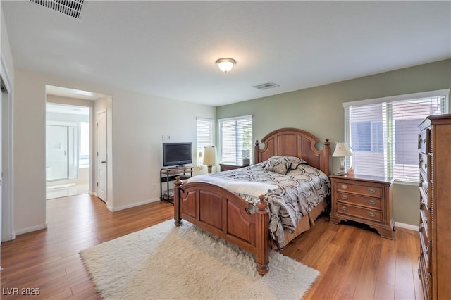 10353 Yew Blossom Ave, Las Vegas, NV 89166 - bedroom featuring light wood-style flooring and baseboards