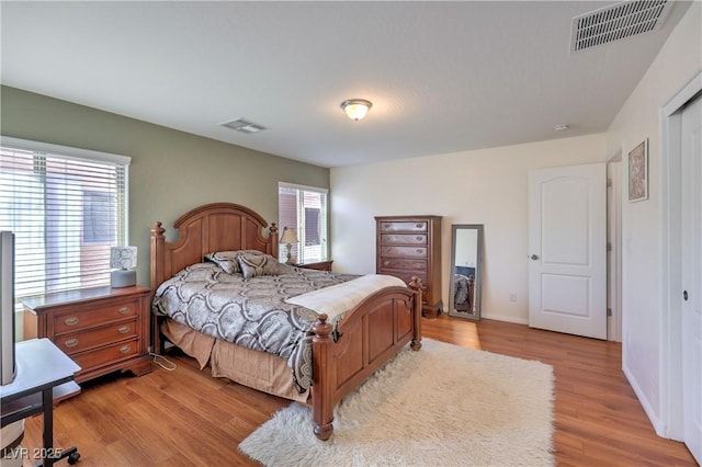 10353 Yew Blossom Ave, Las Vegas, NV 89166 - bedroom featuring light wood-style floors