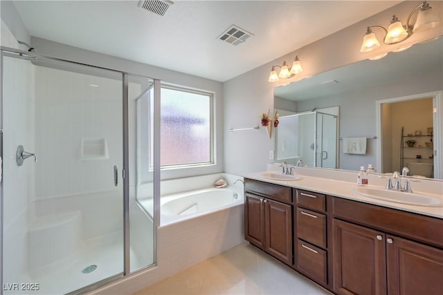 10353 Yew Blossom Ave, Las Vegas, NV 89166 - bathroom with a stall shower, double vanity, a bath, and tile patterned floors