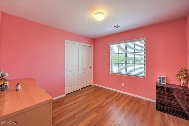 10353 Yew Blossom Ave, Las Vegas, NV 89166 - home office featuring light wood finished floors and baseboards