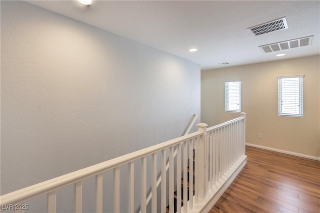10353 Yew Blossom Ave, Las Vegas, NV 89166 - hall with wood finished floors, an upstairs landing, baseboards, and recessed lighting