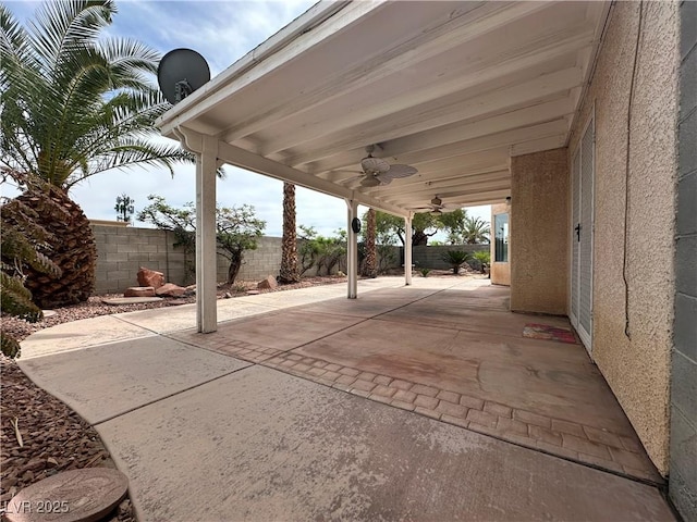 3340 Shallow Pond Dr, Las Vegas, NV 89117 - fenced backyard with a ceiling fan and a patio