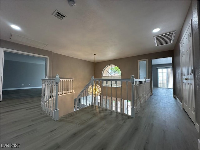 3340 Shallow Pond Dr, Las Vegas, NV 89117 - hallway with wood finished floors, healthy amount of natural light, and baseboards
