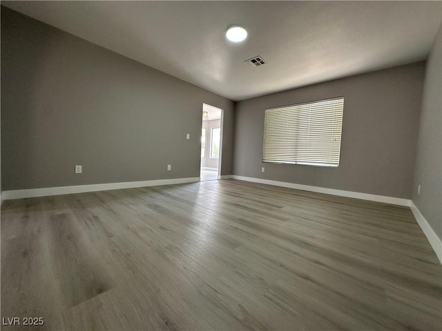 3340 Shallow Pond Dr, Las Vegas, NV 89117 - empty room featuring wood finished floors and baseboards