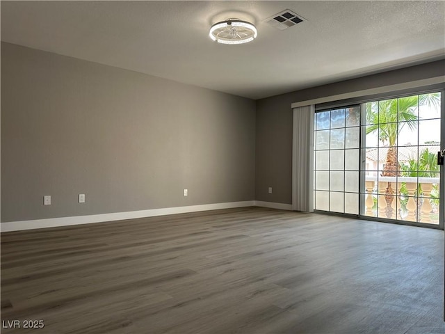 3340 Shallow Pond Dr, Las Vegas, NV 89117 - empty room featuring baseboards and wood finished floors