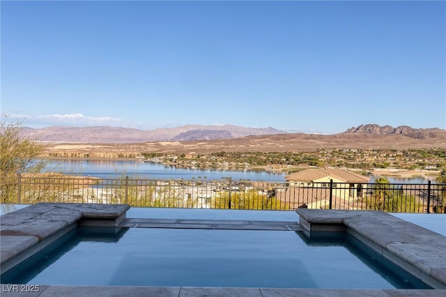 8 Laricola Ct, Henderson, NV 89011 - view of pool featuring a water and mountain view