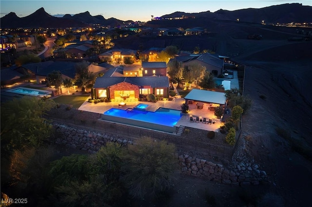 8 Laricola Ct, Henderson, NV 89011 - view of subject property featuring a pool area and a mountain backdrop