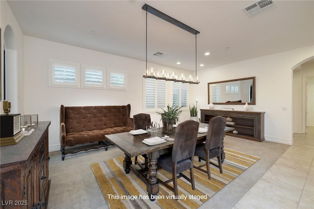8 Laricola Ct, Henderson, NV 89011 - dining room with arched walkways, baseboards, and recessed lighting