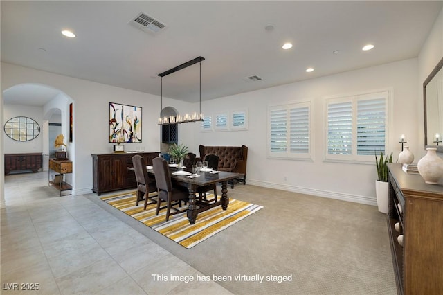 8 Laricola Ct, Henderson, NV 89011 - dining room featuring arched walkways, recessed lighting, and baseboards