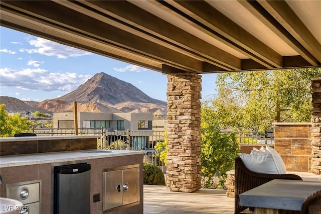 8 Laricola Ct, Henderson, NV 89011 - view of patio / terrace with a mountain view and area for grilling