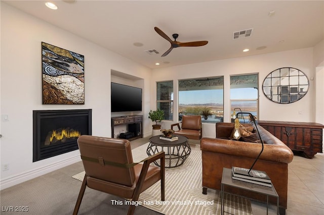 8 Laricola Ct, Henderson, NV 89011 - living area featuring a ceiling fan, a glass covered fireplace, and recessed lighting