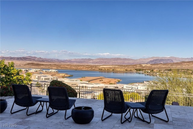 8 Laricola Ct, Henderson, NV 89011 - view of patio / terrace with a water and mountain view