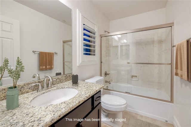 8 Laricola Ct, Henderson, NV 89011 - full bathroom featuring vanity, toilet, combined bath / shower with glass door, and tile patterned flooring