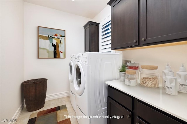 8 Laricola Ct, Henderson, NV 89011 - laundry area featuring cabinet space, separate washer and dryer, baseboards, and light tile patterned floors