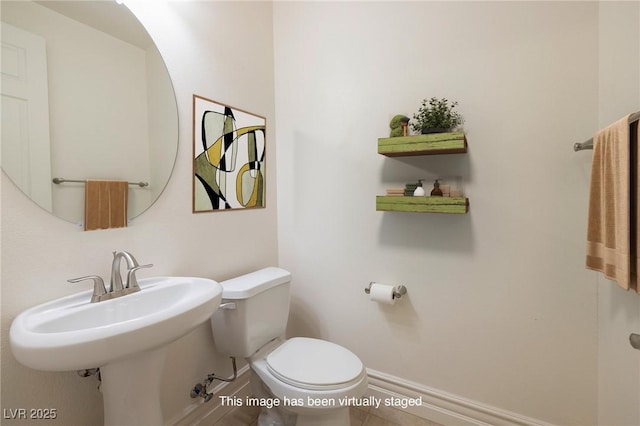 8 Laricola Ct, Henderson, NV 89011 - half bath with toilet, baseboards, and tile patterned flooring