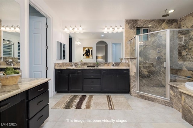 8 Laricola Ct, Henderson, NV 89011 - full bath with a shower stall, double vanity, a tub with marble appearance, and tile patterned flooring