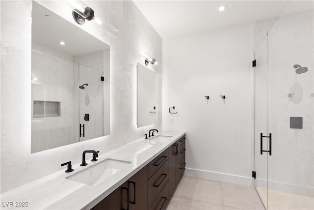 6 Rockmount Ct, Henderson, NV 89012 - full bathroom with a shower stall, double vanity, tile patterned flooring, baseboards, and recessed lighting