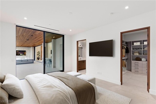 6 Rockmount Ct, Henderson, NV 89012 - bedroom with a spacious closet, recessed lighting, wood ceiling, a closet, and ensuite bath