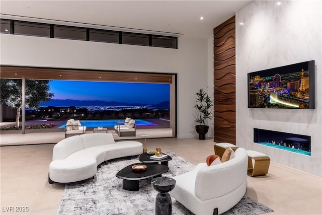 6 Rockmount Ct, Henderson, NV 89012 - living area featuring a lit fireplace