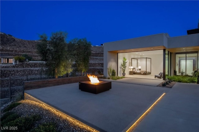 6 Rockmount Ct, Henderson, NV 89012 - view of patio / terrace featuring an outdoor fire pit