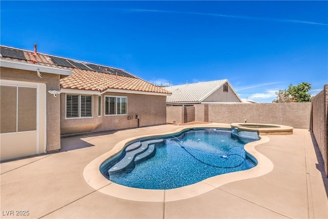 1044 Spanish Needle St, Henderson, NV 89002 - view of swimming pool with a pool with connected hot tub, a patio, and a fenced backyard