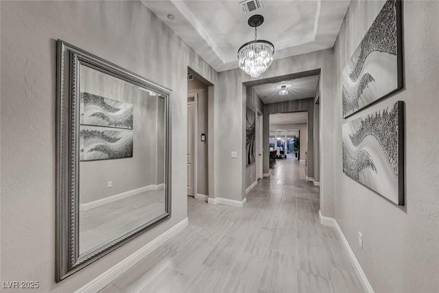 101 Mirage View Dr, Henderson, NV 89011 - hall with a chandelier and baseboards