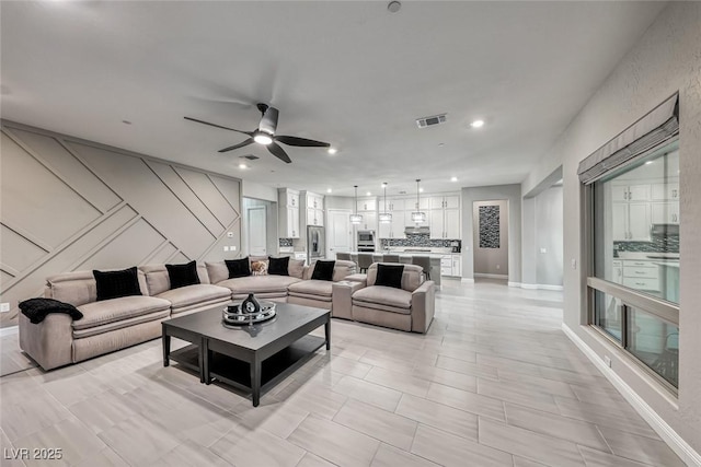 101 Mirage View Dr, Henderson, NV 89011 - living area with a ceiling fan, recessed lighting, and baseboards