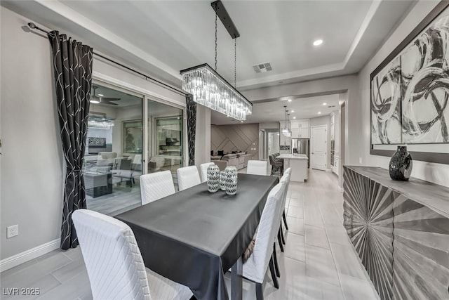 101 Mirage View Dr, Henderson, NV 89011 - dining area with light tile patterned flooring, baseboards, a chandelier, and recessed lighting