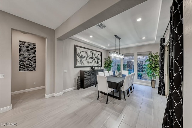101 Mirage View Dr, Henderson, NV 89011 - dining area with a raised ceiling, recessed lighting, baseboards, and light wood-style floors