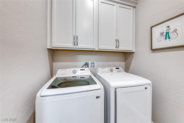 101 Mirage View Dr, Henderson, NV 89011 - laundry room featuring cabinet space, washing machine and dryer, and a textured wall