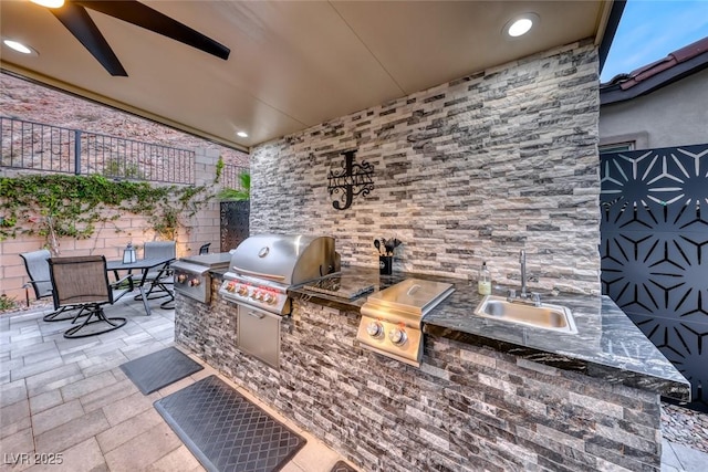 101 Mirage View Dr, Henderson, NV 89011 - view of patio featuring a sink and outdoor dining area
