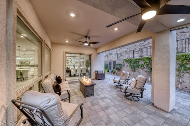 101 Mirage View Dr, Henderson, NV 89011 - view of patio with a fire pit and a ceiling fan