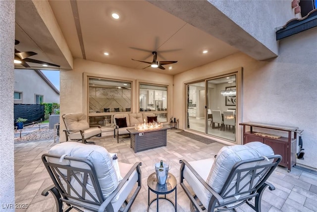 101 Mirage View Dr, Henderson, NV 89011 - view of patio with an outdoor living space with a fire pit and a ceiling fan