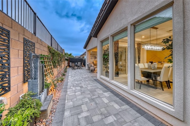 101 Mirage View Dr, Henderson, NV 89011 - fenced backyard featuring a patio and outdoor dining space