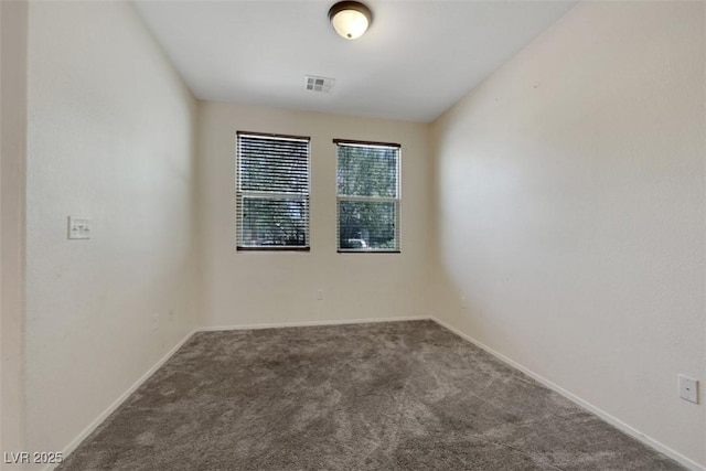 2117 Leatherbridge Ct, North Las Vegas, NV 89081 - spare room featuring carpet floors and baseboards