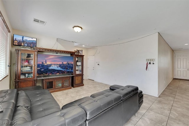 2117 Leatherbridge Ct, North Las Vegas, NV 89081 - living area featuring light tile patterned floors
