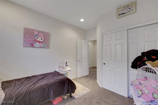 2117 Leatherbridge Ct, North Las Vegas, NV 89081 - bedroom with light colored carpet, recessed lighting, a closet, and baseboards