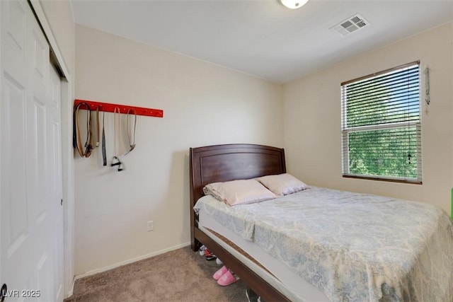 2117 Leatherbridge Ct, North Las Vegas, NV 89081 - carpeted bedroom with baseboards and a closet