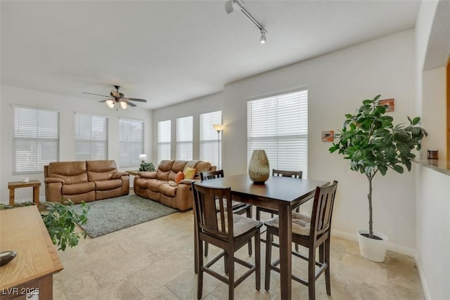 10001 Peace Way Unit 1250, Las Vegas, NV 89147 - dining space with a ceiling fan and baseboards